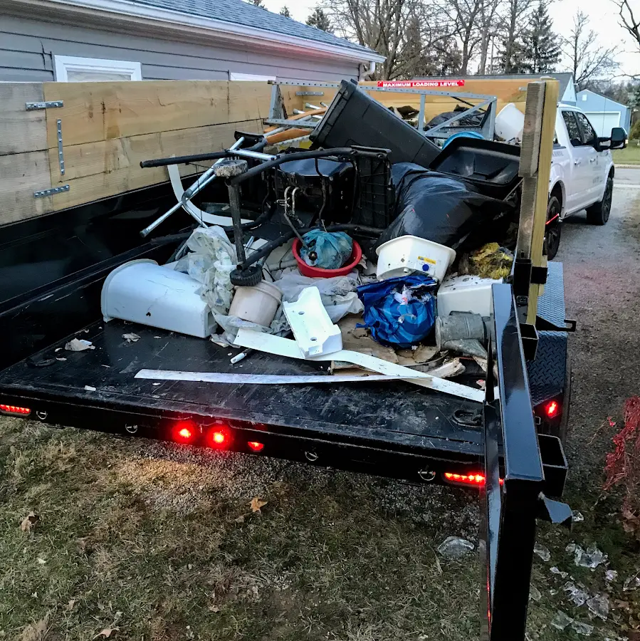 Roll-off dumpster delivered to a residential driveway in Bithlo