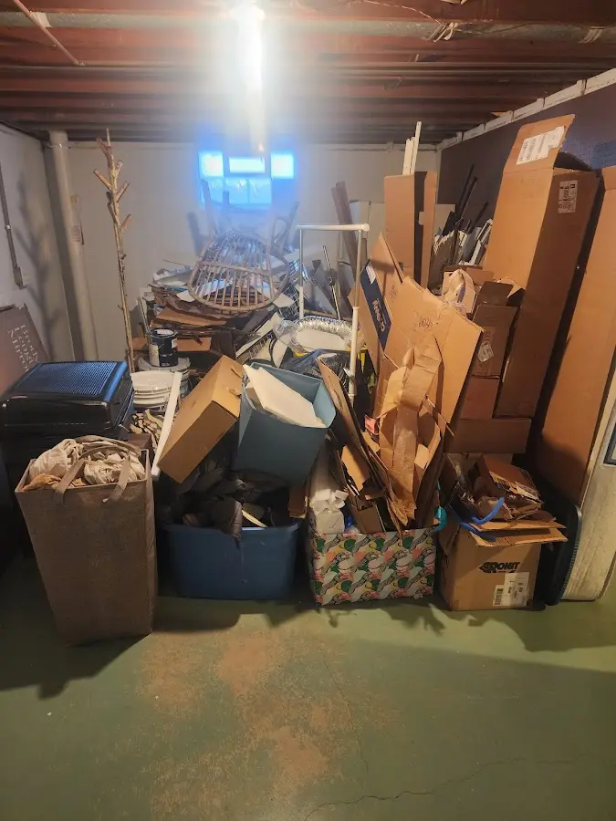 Roll-off dumpster container at job site for 2 Yard Dumpster Rental in Bithlo